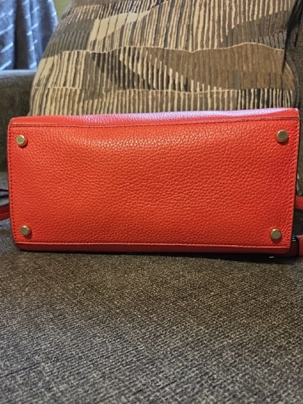 kate spade orange pebbled leather tote with tassel